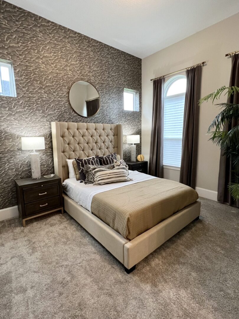 Design a bedroom featuring beige carpet and a bed.