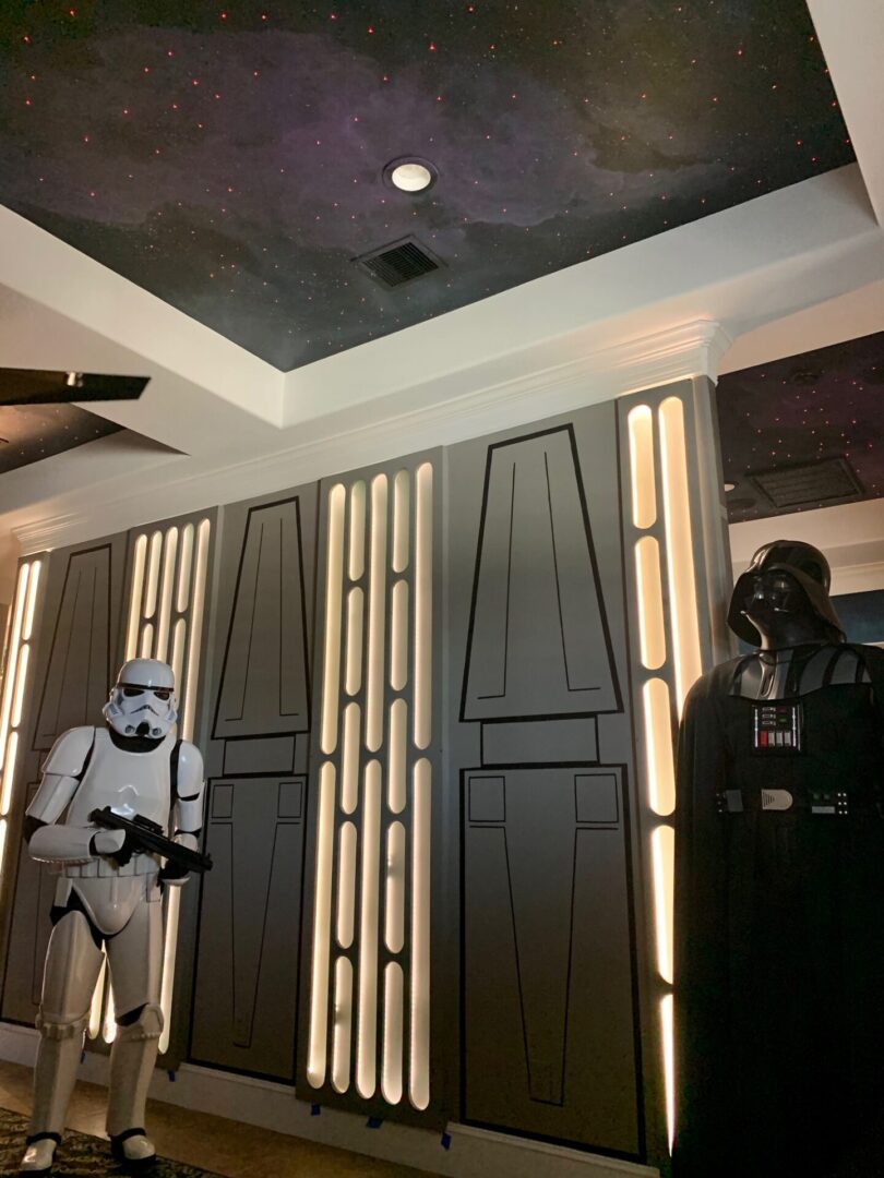 A star wars themed room with a Darth Vader statue is exquisitely designed.